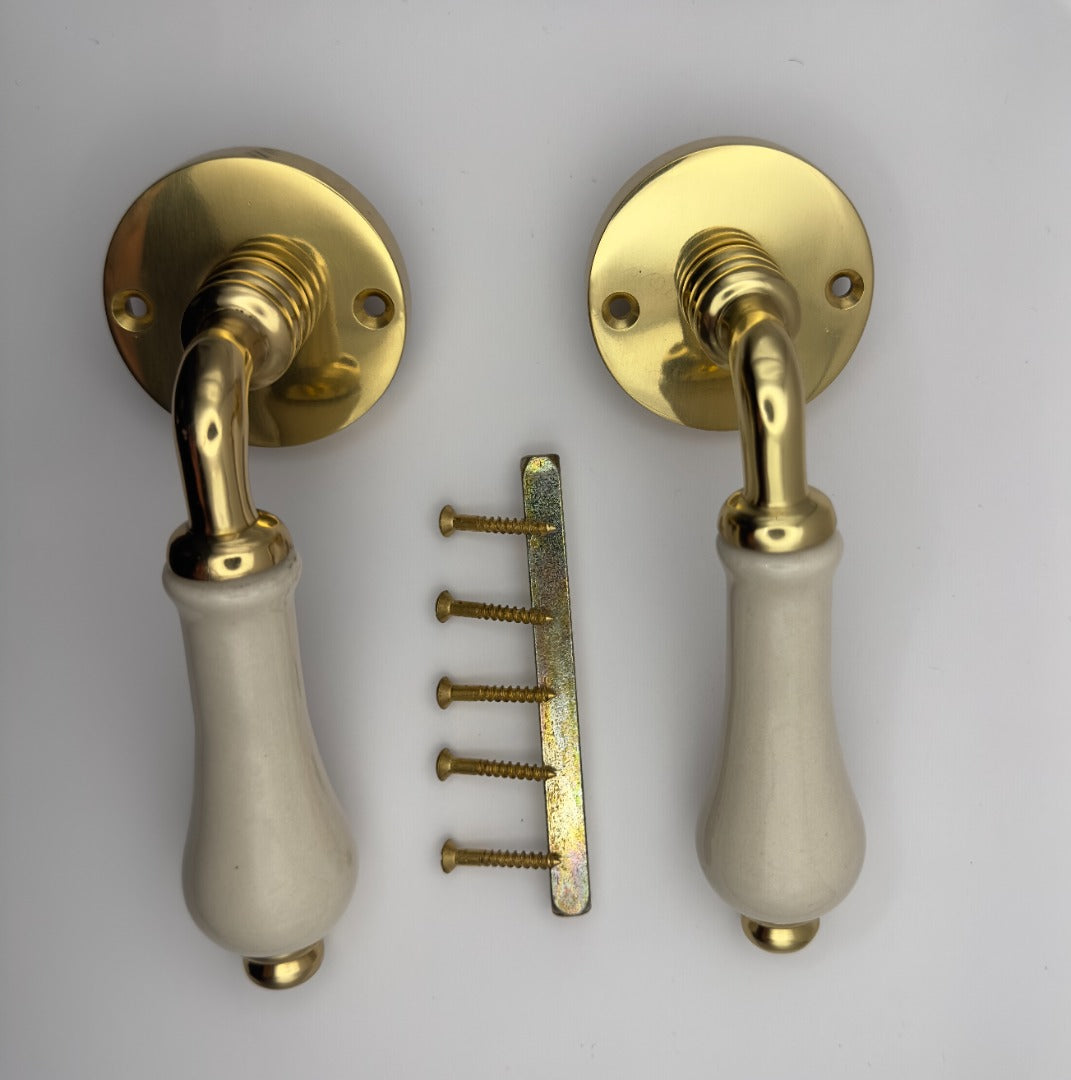 B&M Vintage Brass Lever on Rose with Ivory Porcelain Handle Polished Brass