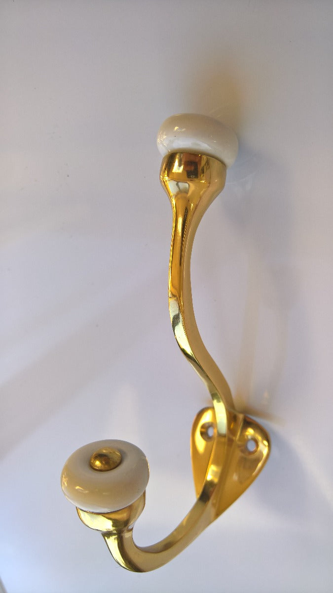 B&M Coat and Hat Hook with Porcelain TIP Finished in Polished Brass