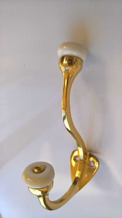 B&M Coat and Hat Hook with Porcelain TIP Finished in Polished Brass
